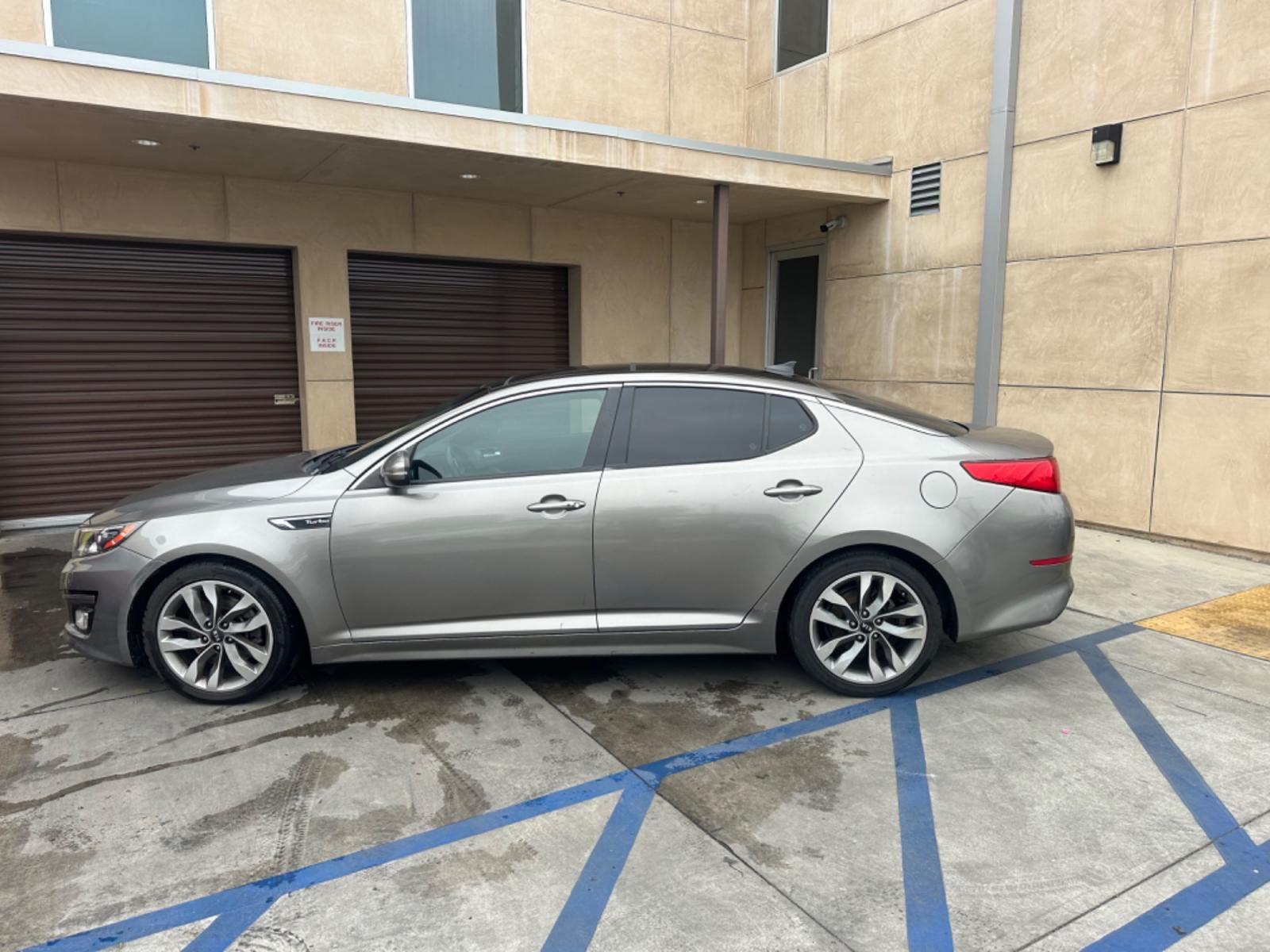 2014 Gray /BLACK Kia Optima SX Turbo (5XXGR4A62EG) with an 2.0L L4 DOHC 16V TURBO engine, 6-Speed Automatic transmission, located at 30 S. Berkeley Avenue, Pasadena, CA, 91107, (626) 248-7567, 34.145447, -118.109398 - New tires! Moon Roof! Nice Interior! Looks and drives good! Bad credit? We can help! We are the bank. All our cars are thoroughly inspected and reconditioned by our technicians. FREE CARFAX report. Stop by or call to speak with our friendly staff. Whether you have bad credit, no credit, bankruptcy, - Photo #1
